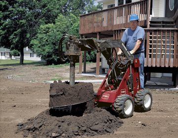 Toro Dingo TX 220 with high torque auger attachment