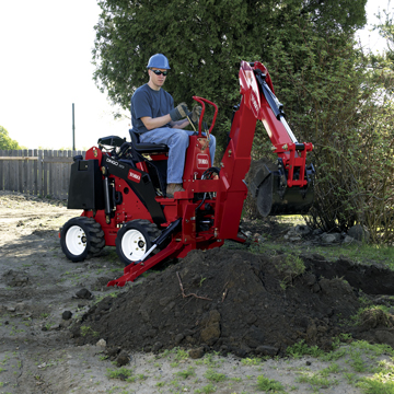 Toro Dingo TX 323 with backhoe attachment