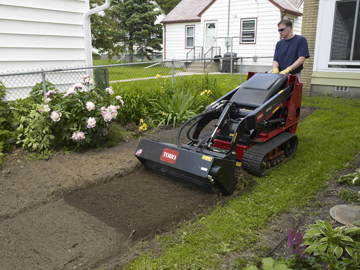 Toro Dingo TX 427 WIde Track with Tiller Attachment