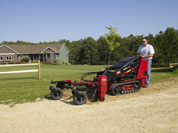 Toro Dingo TX 427 Narrow Track with Harley Rake