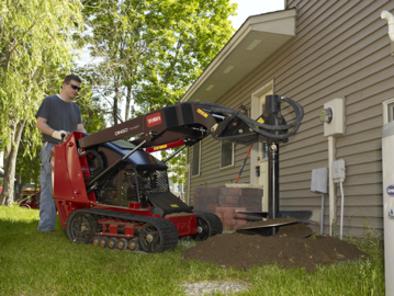 Toro Dingo TX 525 Narrow Track with High Torque Auger Attachment