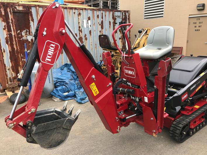 used toro dingo backhoe attachment